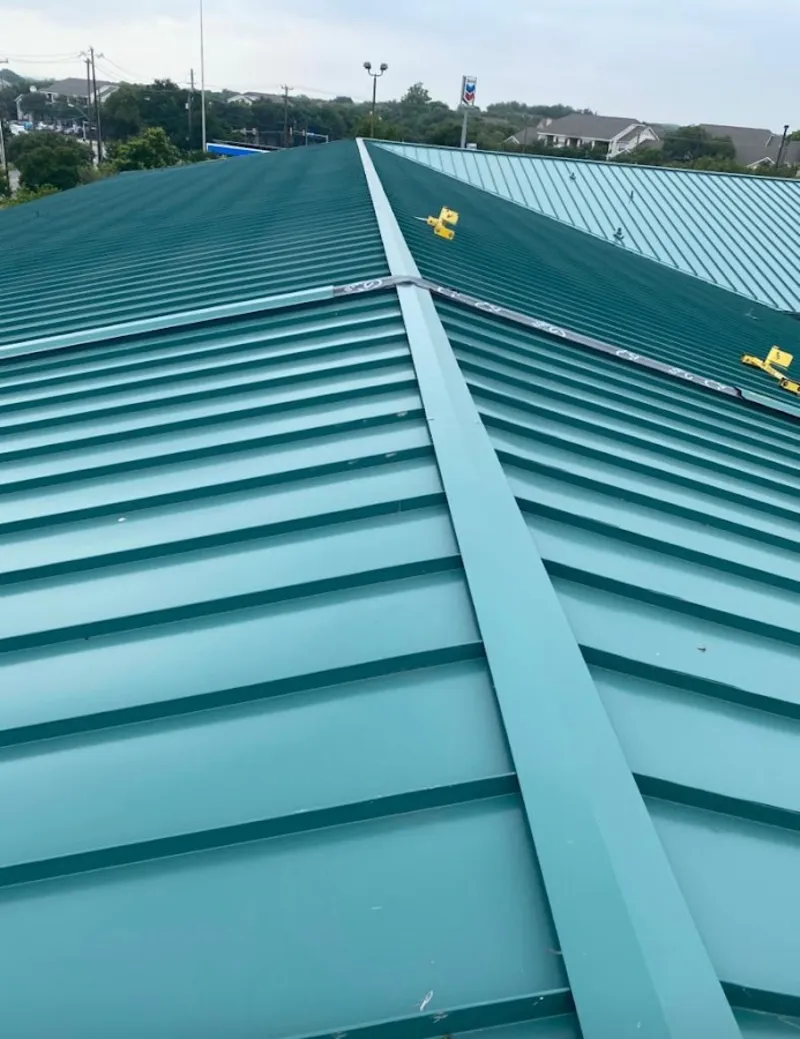 Green commercial metal roof ridge and valley for Metal Roof Repair in Brecksville